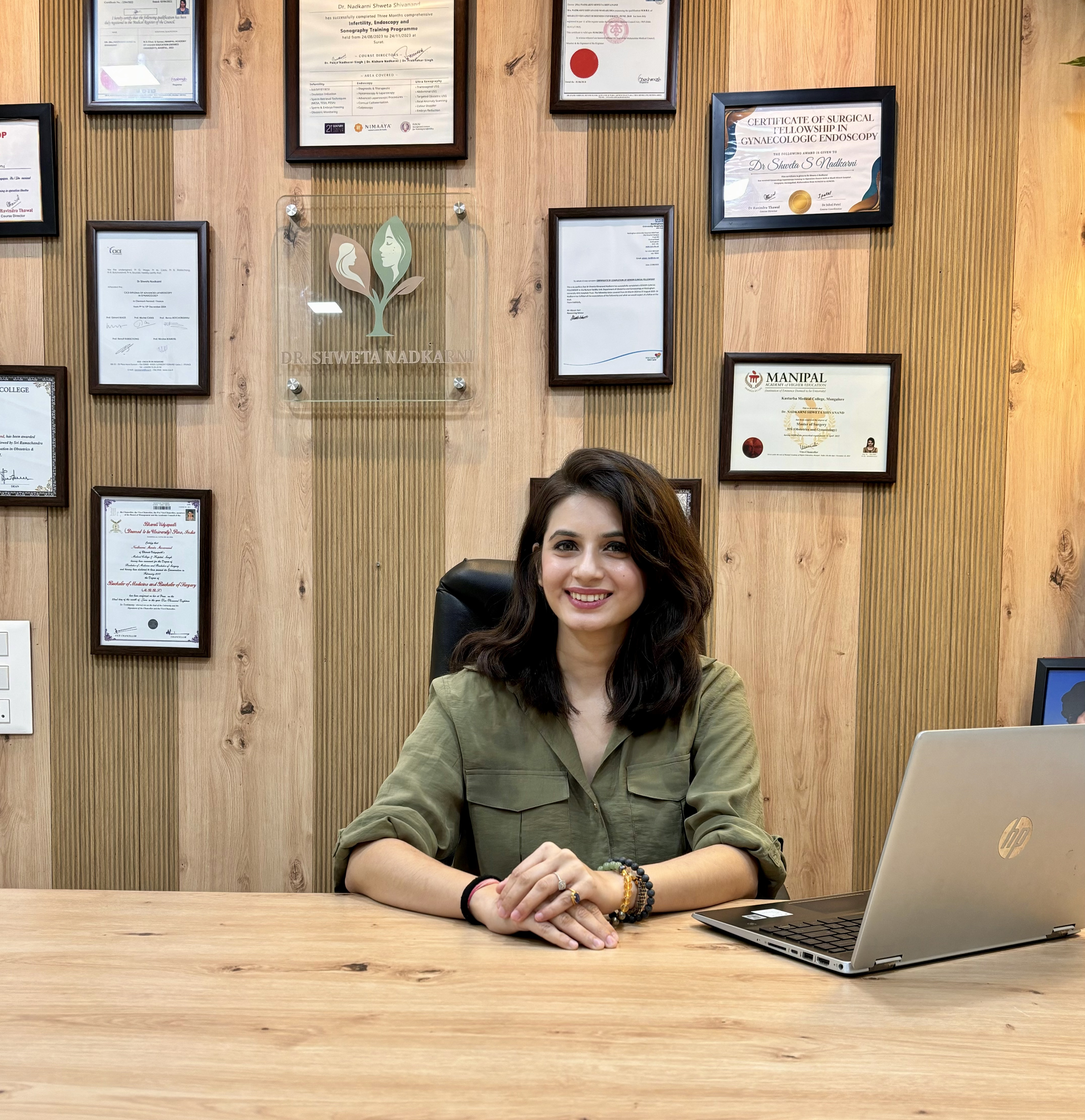 Dr. Shweta Nadkarni seated in her clinic