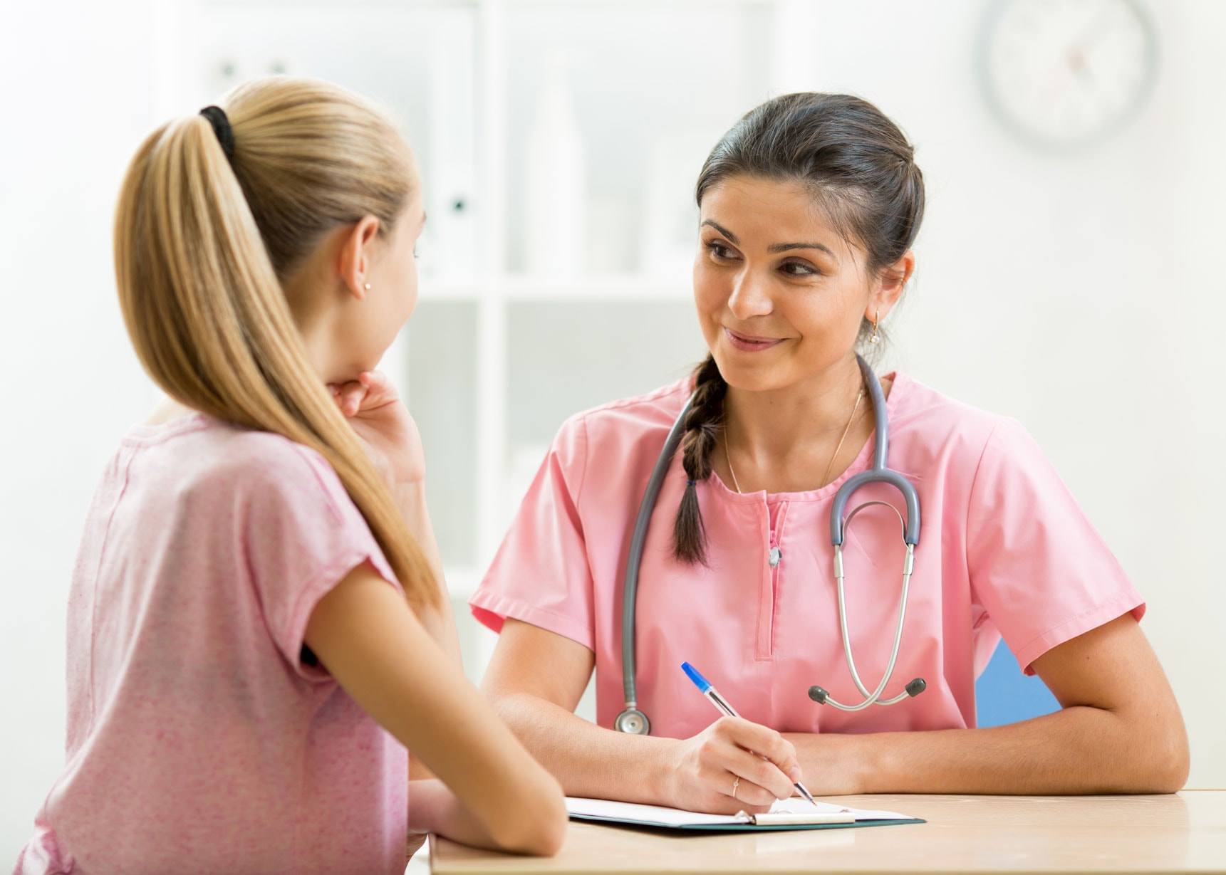 Dr. Shweta Nadkarni offering patient guidance at her clinic